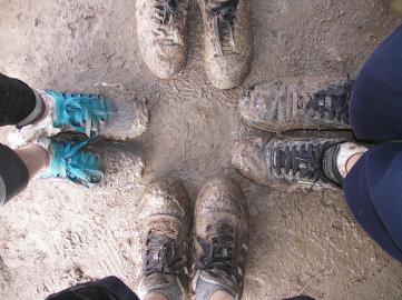 A photo of muddy shoes,
